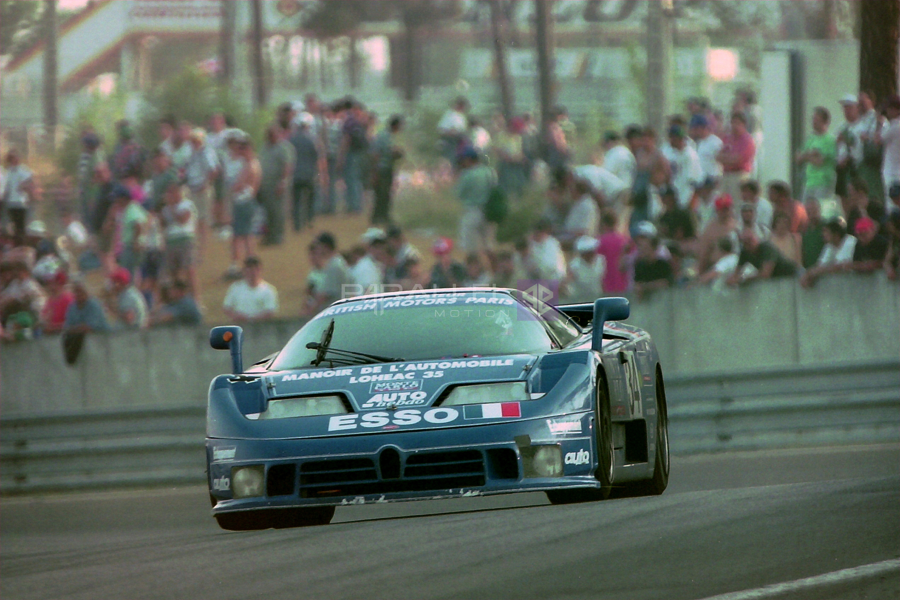 Bugatti_EB110_SS_-_Alain_Cudini_Eric_Helary__Jean-Christophe_Boullion_exits_the_Esses_at_the_1994_Le_31933578606