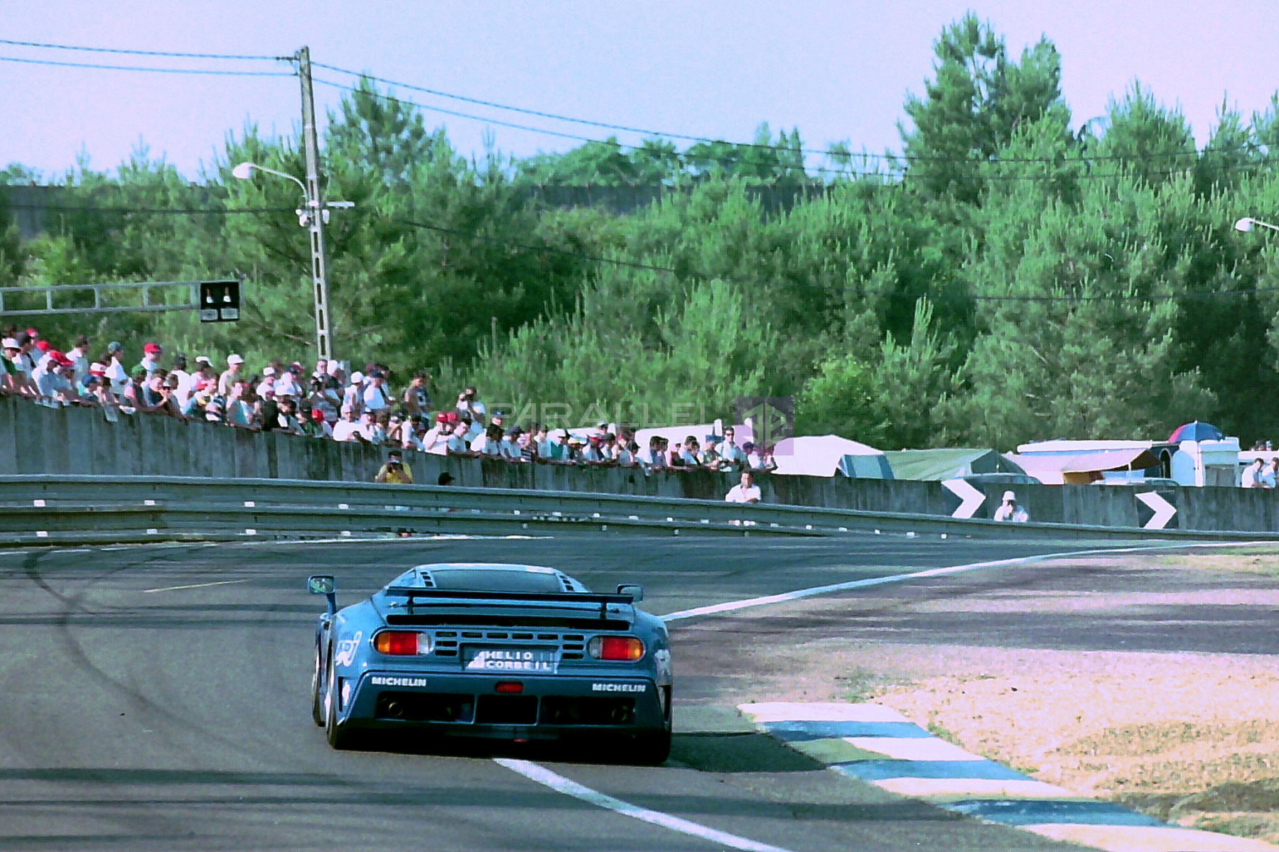 Bugatti_EB110_SS_-_Alain_Cudini_Eric_Helary__Jean-Christophe_Boullion_exits_the_Esses_at_the_1994_Le_Mans_31933579606